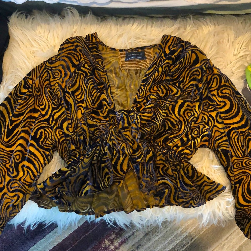 Long sleeve orange and black zebra print shirt